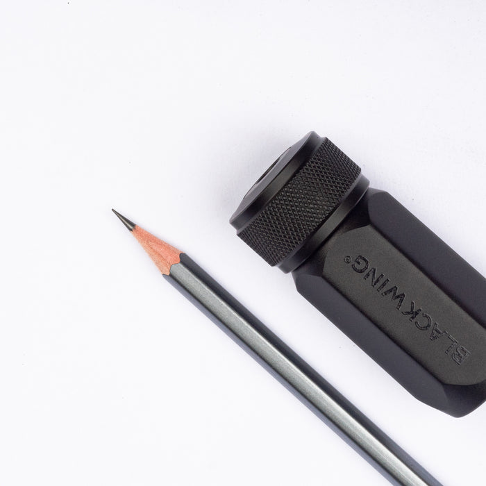 The aluminum body with its hexagonal shape- matching the pencil of course-  is easy to grip while sharpening, and easy to open for emptying.