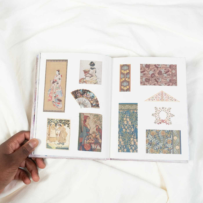 Open book displaying traditional illustrations and patterns on a white background