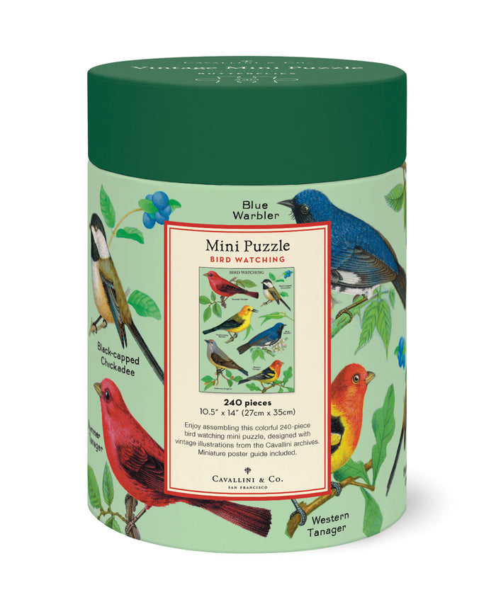 Cylindrical puzzle box with bird illustrations on a white background
