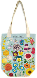 Tote bag with floral design and 'BOTANICA' branding on a light blue background