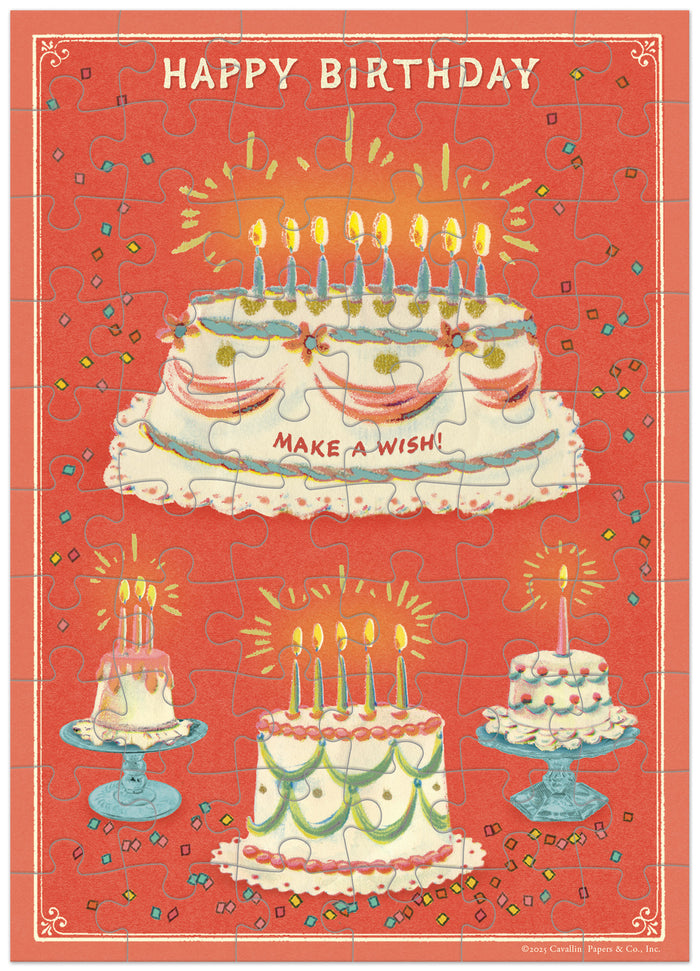 Jigsaw puzzle greeting card with a birthday cake design on a red background