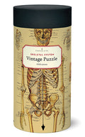 Cavallini's Skeleton puzzle features their Skeleton Decorative paper, a vintage chart of the human skeletal system, complete with scientific names of all bones!