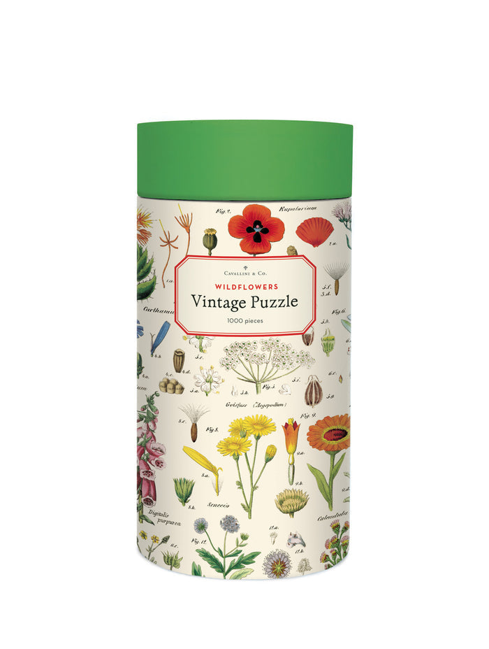 Cavallini & Co. Wildflowers 1000 piece puzzle is densely packed with wildflower images, each having its scientific name alongside. Colorful images of wildflowers adorn this challenging puzzle.