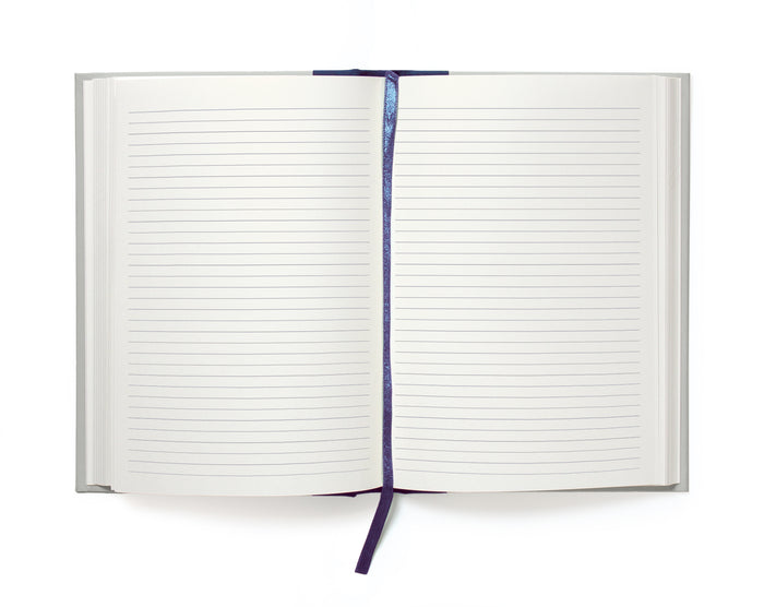 Open notebook with lined pages on a white background