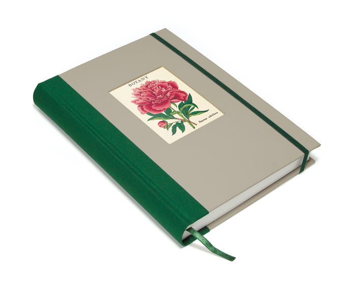 Notebook with floral design on cover against a white background