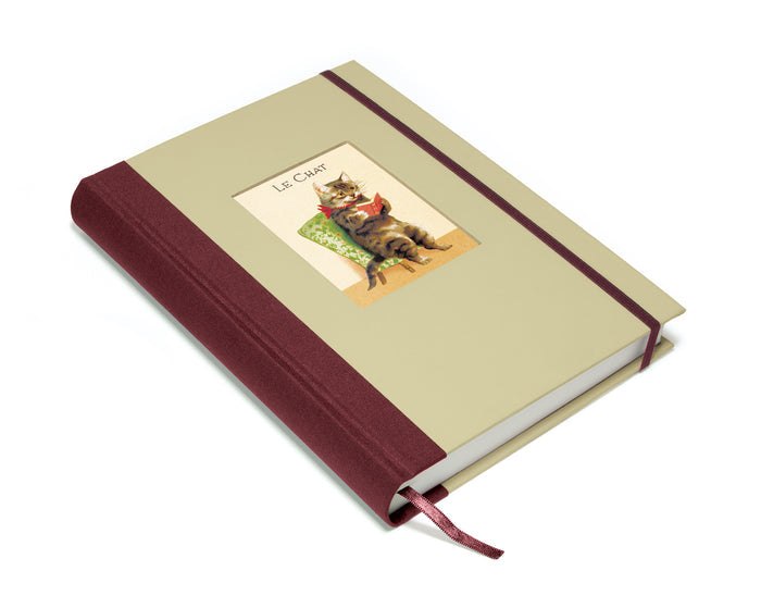 Beige notebook with a red binding featuring an illustration of a cat on the cover.