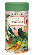 Cavallini & Co. World of Birds 1000 Piece Puzzle-  cylindrical puzzle box with bird illustrations and 'World of Birds' branding