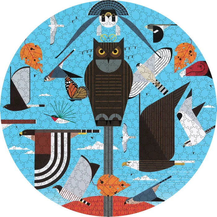 Charley Harper Hawk Mountain 500 Piece Circular Puzzle- Circular puzzle with various animals on a blue background