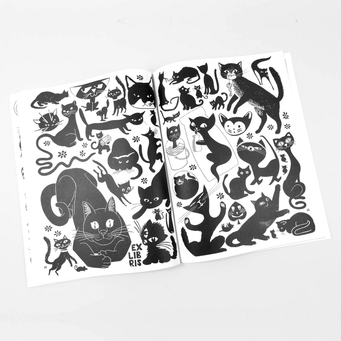 Open book of black cat illustrations on a white background
