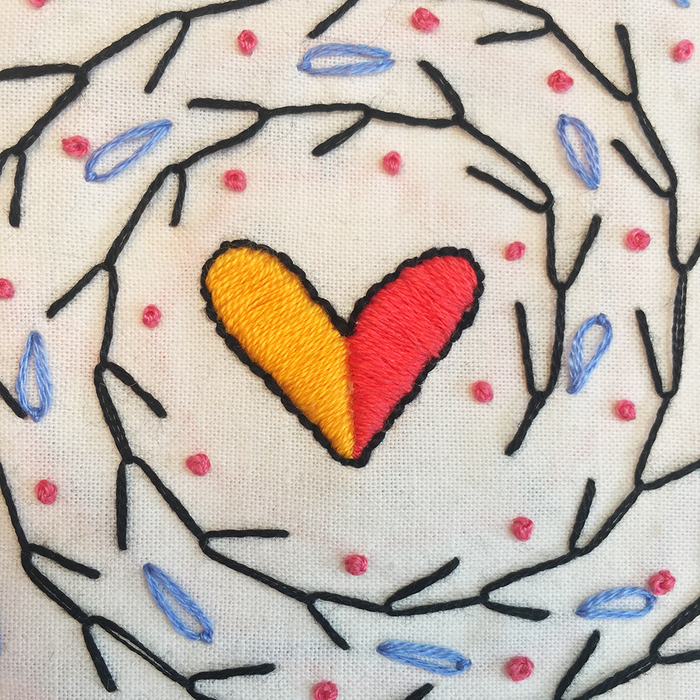 Hand Sampler Embroidery Kit- detail of stitching heart center