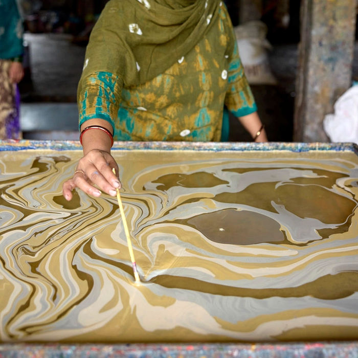 Handmade Indian Cotton Paper- Marbled Champagne -Free Spirit- shades of yellow and gold- marbling in process