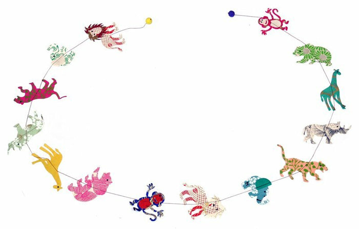Lions, tigers, bears, monkeys, and more are found on the Zoo Animals Garland. Each garland is created from sustainable Lokta paper in Nepal.