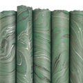 Handmade Marbled Paper- Dark Green with Black, Silver, Gold 5 sheets rolled to show pattern variations
