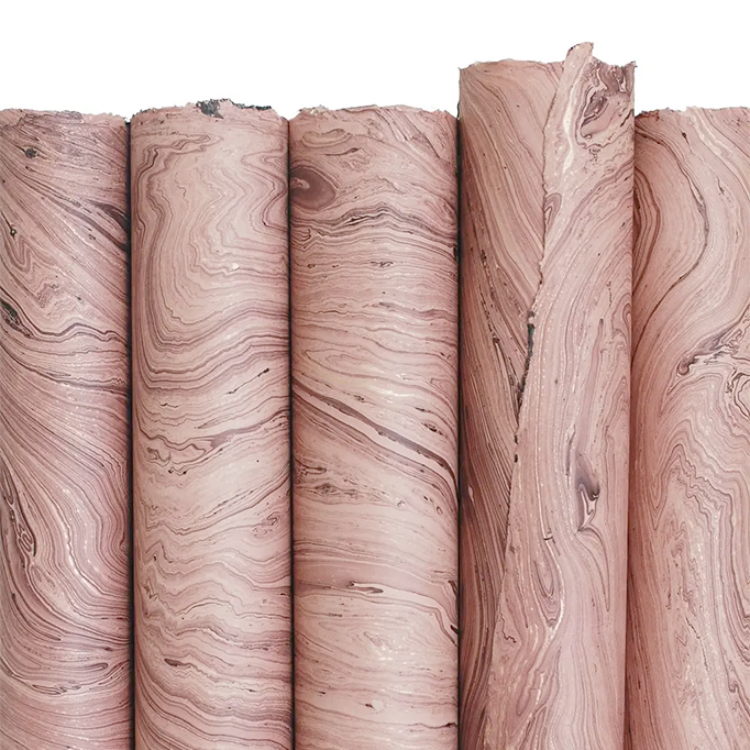 Handmade Marbled Paper- Dusty Pink with Gold and Charcoal 5 sheets rolled to show pattern variations