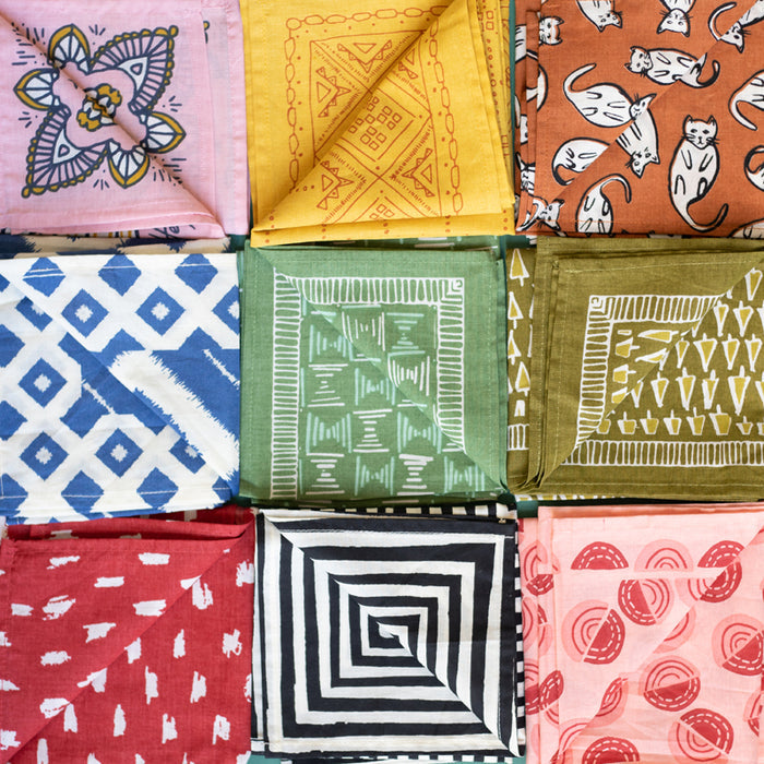 All Hemlock bandanas are printed from hand-drawn original patterns. They are hand screen printed on 100% premium cotton.