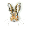 Decorative rabbit head beaded brooch on a white background