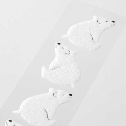 Set includes four fluffy white polar bear stickers for envelope sealing.