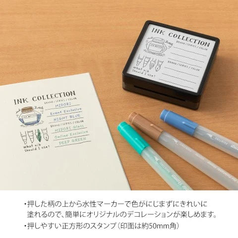 Midori Stamp Pad- Ink Collection stamp- sample stamp with colored inks used on it shown in image