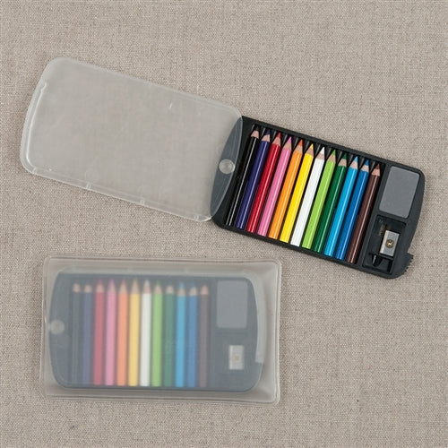 Mini Colored Pencil Set With Case , Eraser and Sharpener- image shows a set of mini colored pencils displayed next to their packaging case, which is clear and contains a sharpener and an eraser.