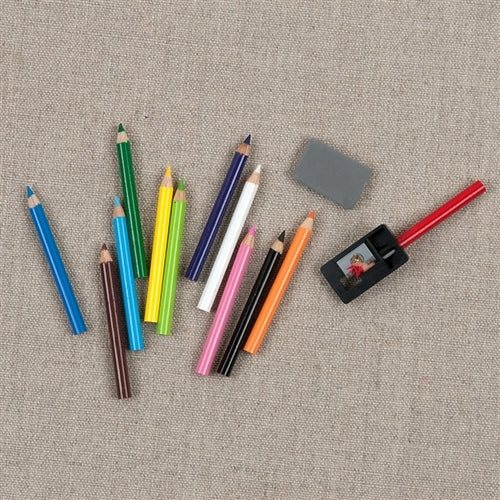 Mini Colored Pencil Set With Case , Eraser and Sharpener shown open with a sharpener and eraser.