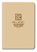 A desert tan Rite in the Rain all-weather memo book with a logo and text on the cover indicating it is a field Flex pocket notebook.