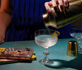 Antique Gold Cocktail Shaker and vintage Vesper Coupe Glasses