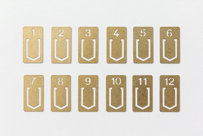 TRAVELER'S COMPANY Brass Number Clips comes with 12 clips.
