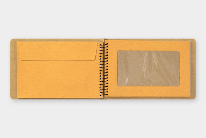 Midori Spiral Ring Notebook- Window Envelope B6 Honeybee- each sheets features a pocket that fits postcards, photos and  any ephemera you might collect on your journey.