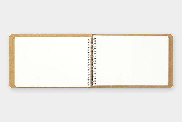 This Horizontal B6 size Traveler's Company notebook has 100 sheets (200 pages) of blank, white MD paper ready for your notes, sketches, photos, and additions.