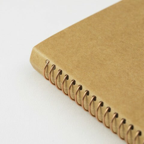 Traveler's Company Spiral Ring Card File Notebook is bound with bronze rings and features a cover made of hearty kraft stock ready for your personal decoration.