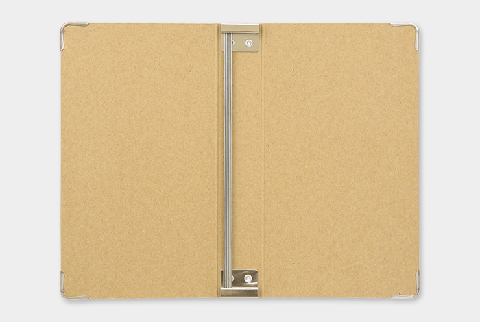 The Binder uses metal rods to hold Midori Traveler's Notebook Refills.
