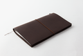 The Regular Size Brown Midori Traveler's Notebook Starter Kit comes with a handmade, cowhide leather cover.
