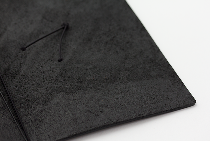 Each TRAVELER'S notebook features soft black leather.